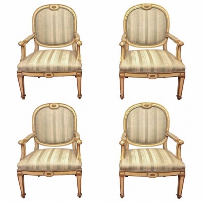 Four Italian Louis XVI Parcel Gilt and Painted Armchairs
